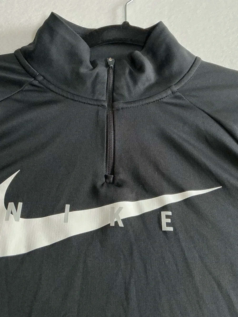 Nike Black Half-Zip Pullover with White Swoosh